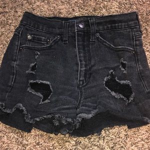 black ripped shorts